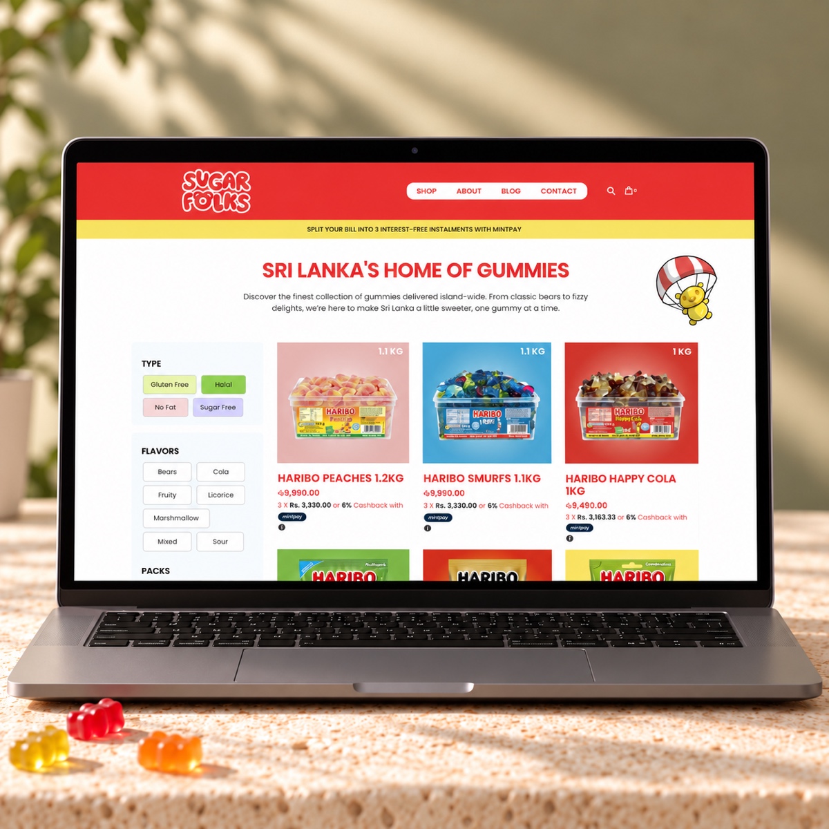 SugarFolks shop catalogue and product filters on a laptop in a square device scene